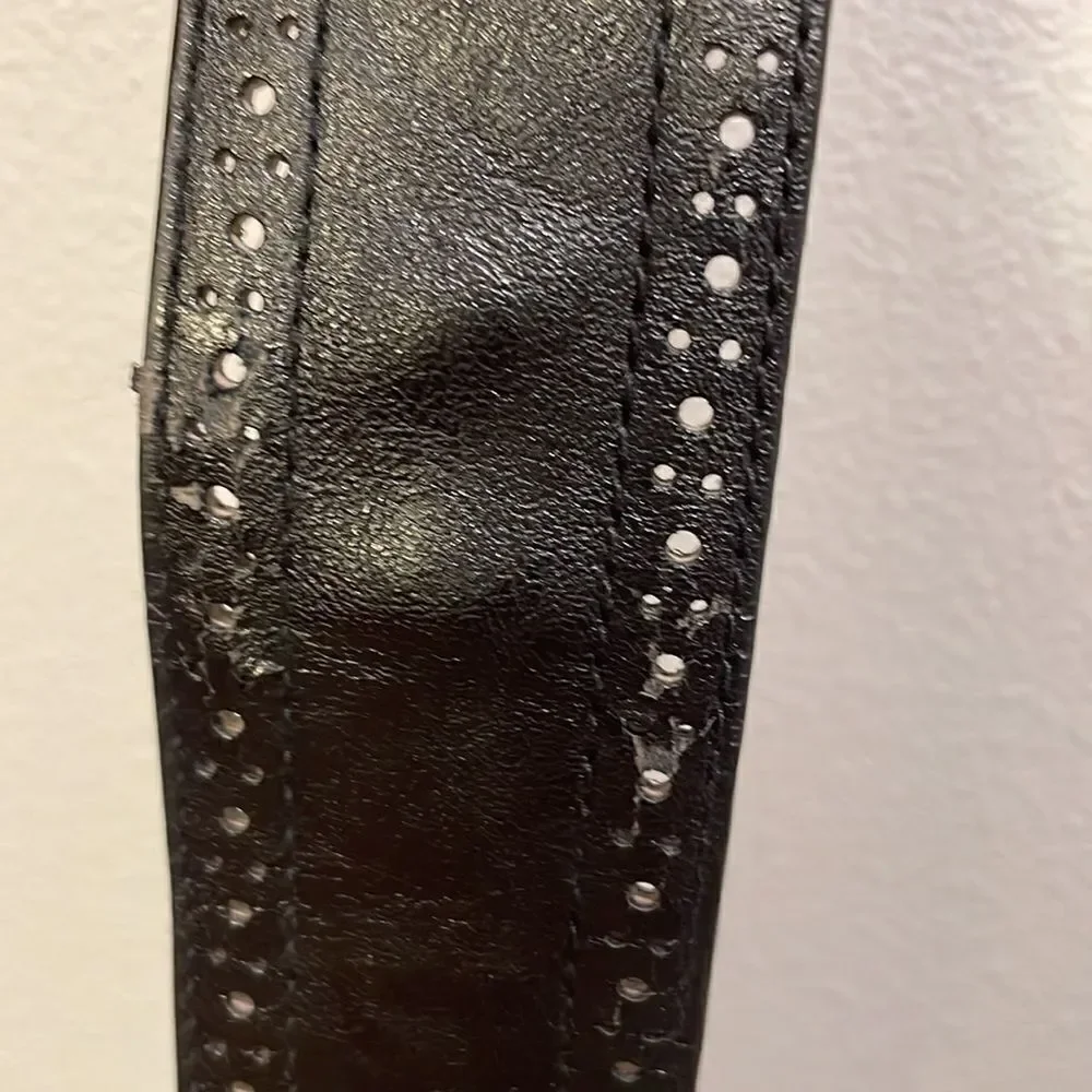 Woman’s black leather belt